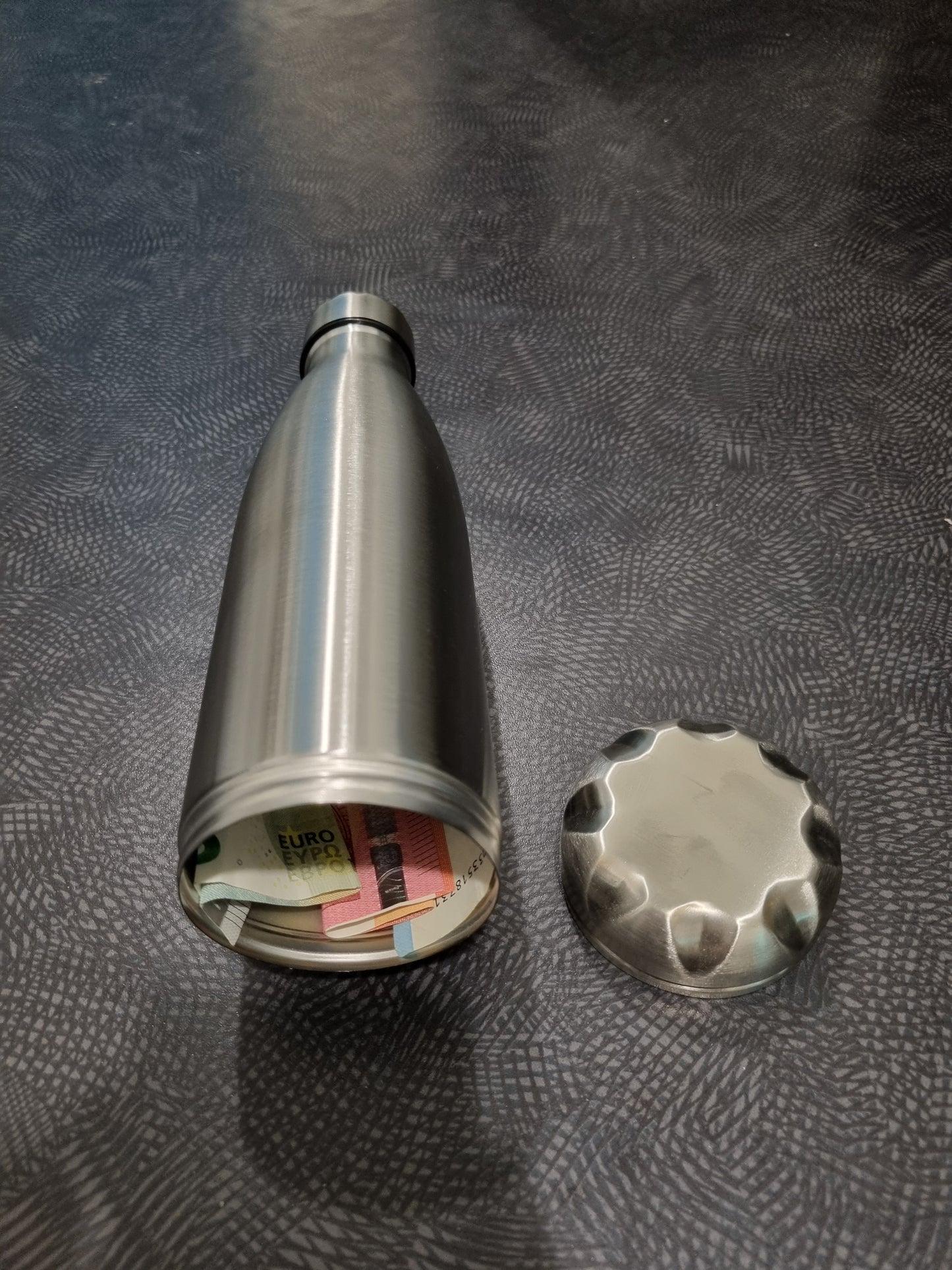 Bouteille cache billets